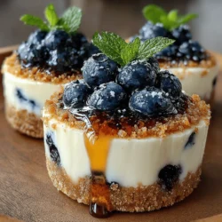 Creating a solid base for your lemon blueberry cups begins with the crust. The crust is not only essential for adding texture but also for holding the filling securely. To prepare the crust, combine crushed graham crackers with melted butter and a touch of sugar. The ratio should be about one and a half cups of crushed graham crackers to a third of a cup of melted butter and two tablespoons of sugar.